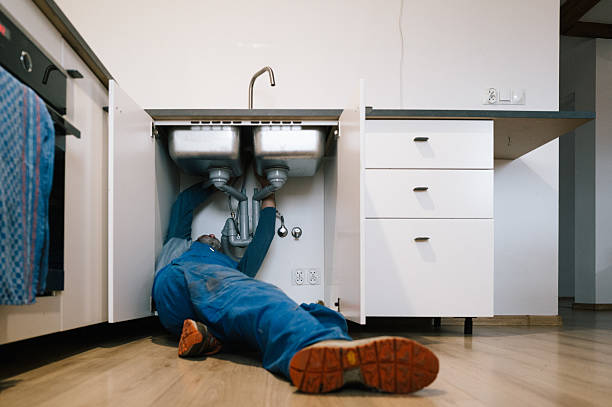 Professional Drain Cleaning technician working in Tampa, FL